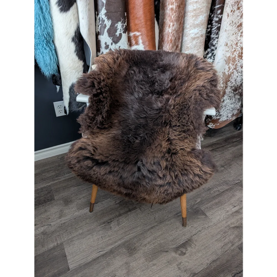 Rare British sheepskin rug, 44x32 fluffy plush on white chair