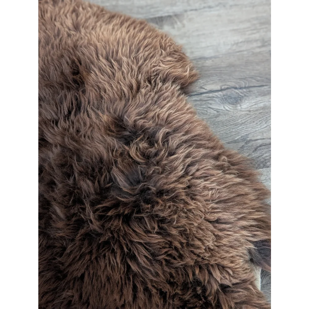Gorgeous fluffy 48x32 British sheepskin rug with curly fur