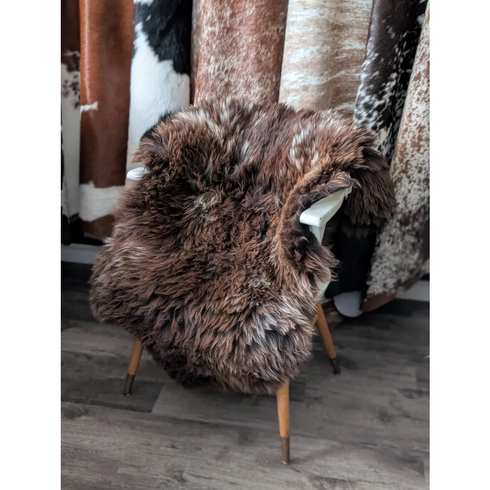 Gorgeous fluffy 46x31 British sheepskin rug on chair