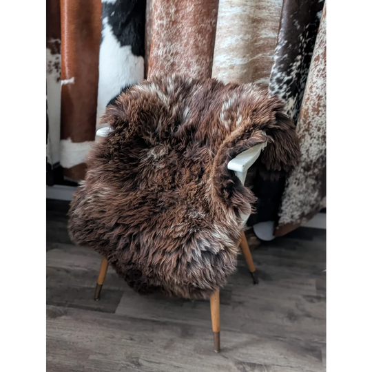 Gorgeous fluffy 46x31 British sheepskin rug on chair