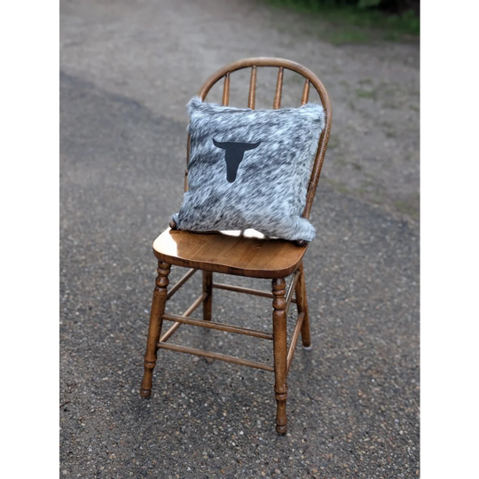 Gray and white speckled double sided cowhide cushion with black steer head design for mini moo double fans