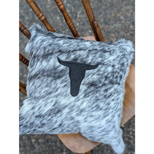 Gray and white speckled double sided cowhide cushion with black stitched bull head emblem from mini moo double
