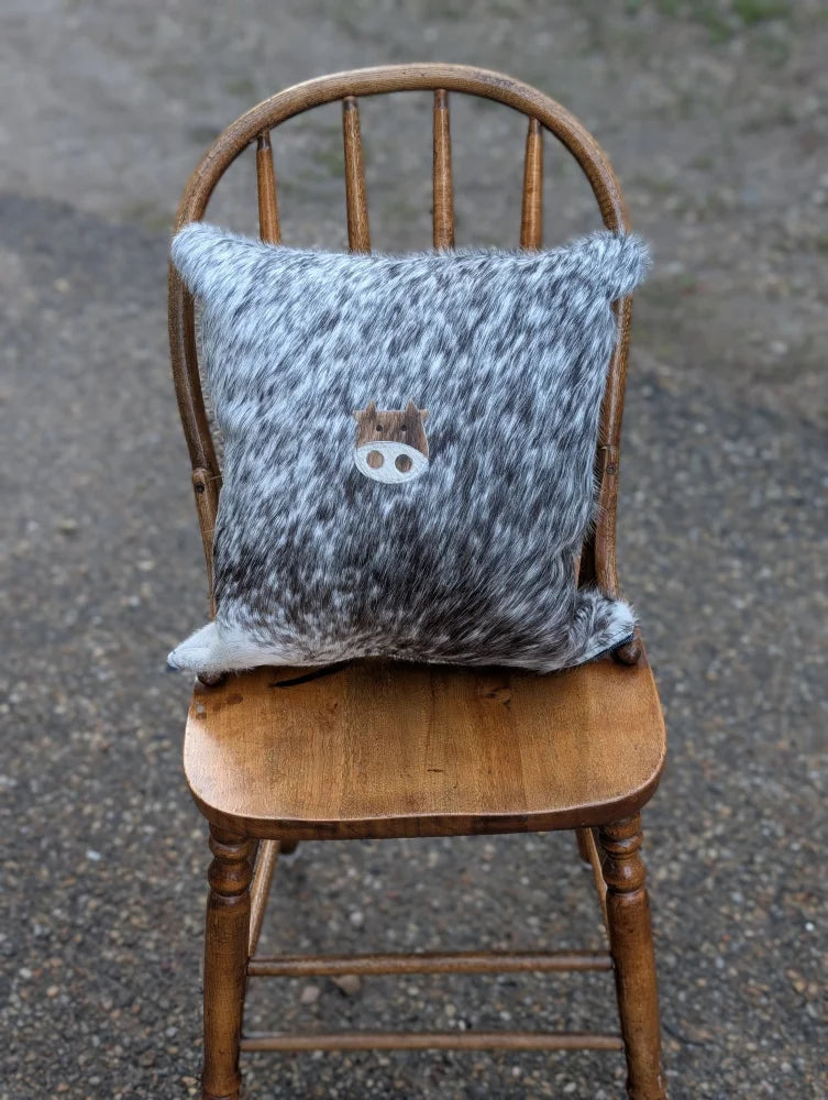 Gray and white double sided cowhide cushion mini moo with brown felt pig face appliqué on speckled cowhide