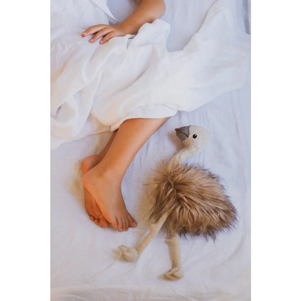 Eddie the Emu white ostrich plush with angus oliver sheepskin rug vibes