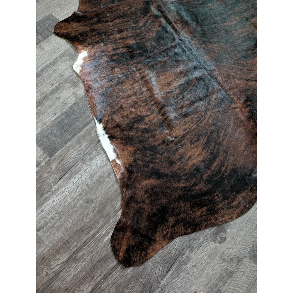 Brown and black cowhide rug with white patches large cowhide perfect for adding style with beautiful rugs