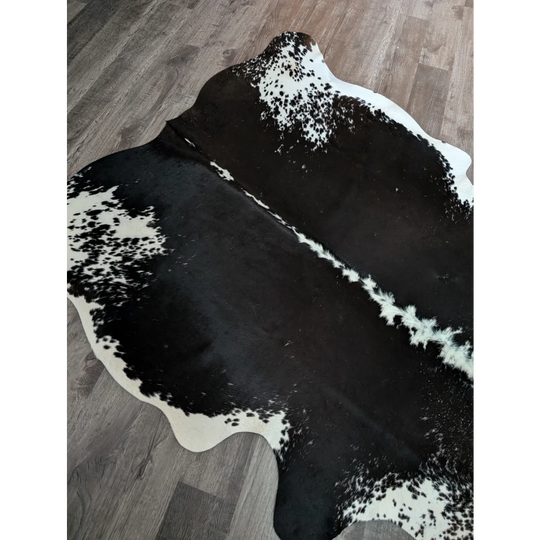 Large black and white cowhide rug es03 with beautiful natural irregular edges perfect for stylish decor