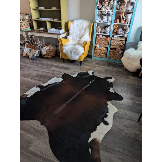 Brown and white large cowhide rug es04 with a natural irregular pattern perfect for beautiful rugs and decor