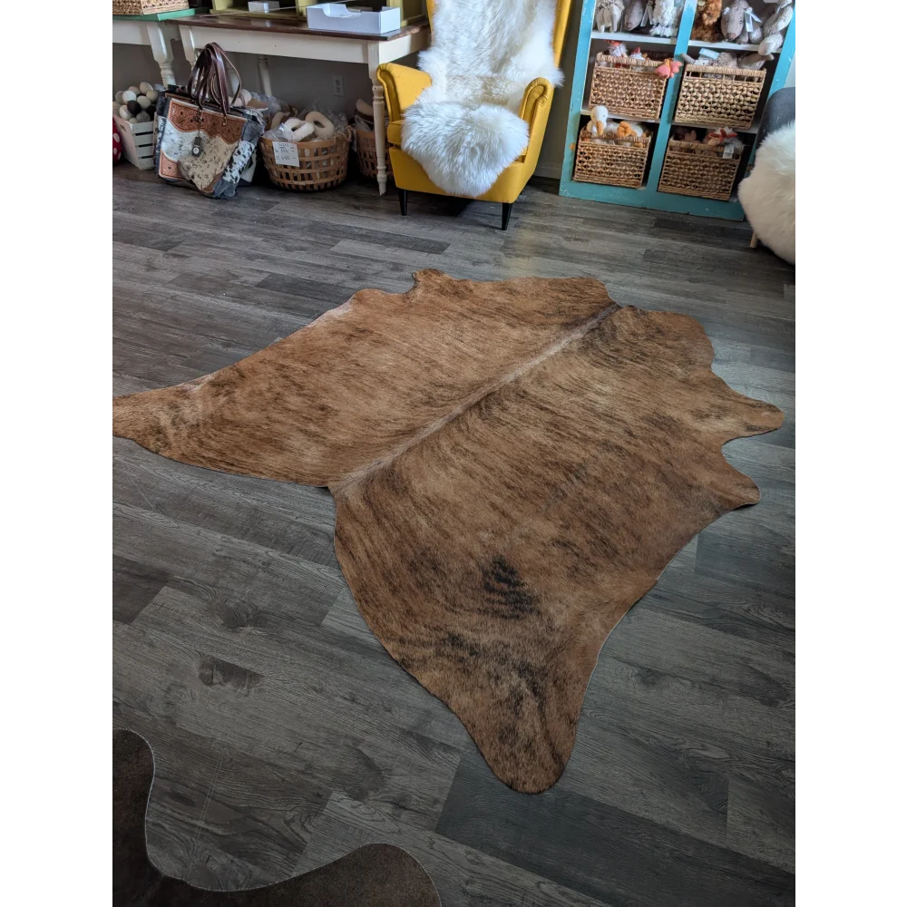 Brown large cowhide rug es09 with natural irregular edges and textured surface perfect for beautiful rugs