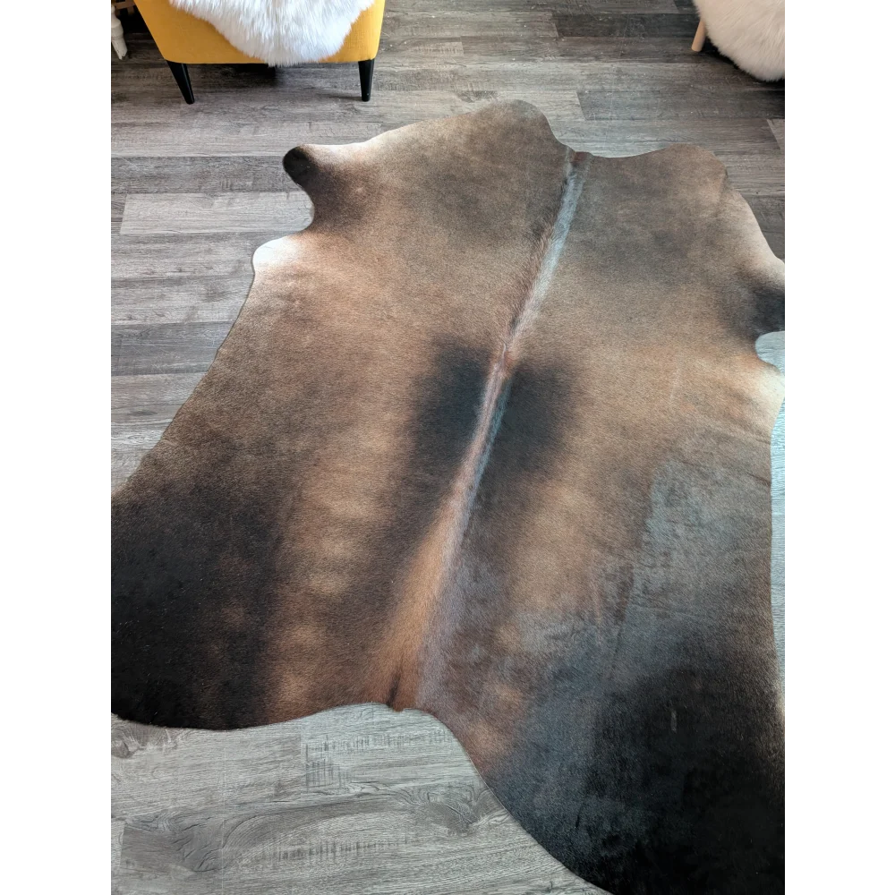 Large cowhide rug es10 with natural brown and black tones and a textured, slightly worn surface perfect for beautiful rugs
