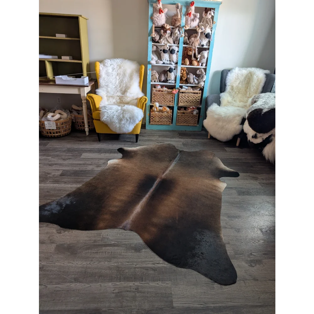 Gorgeous 79 x 63 large cowhide rug with beautiful natural brown and black fur texture perfect for home decor