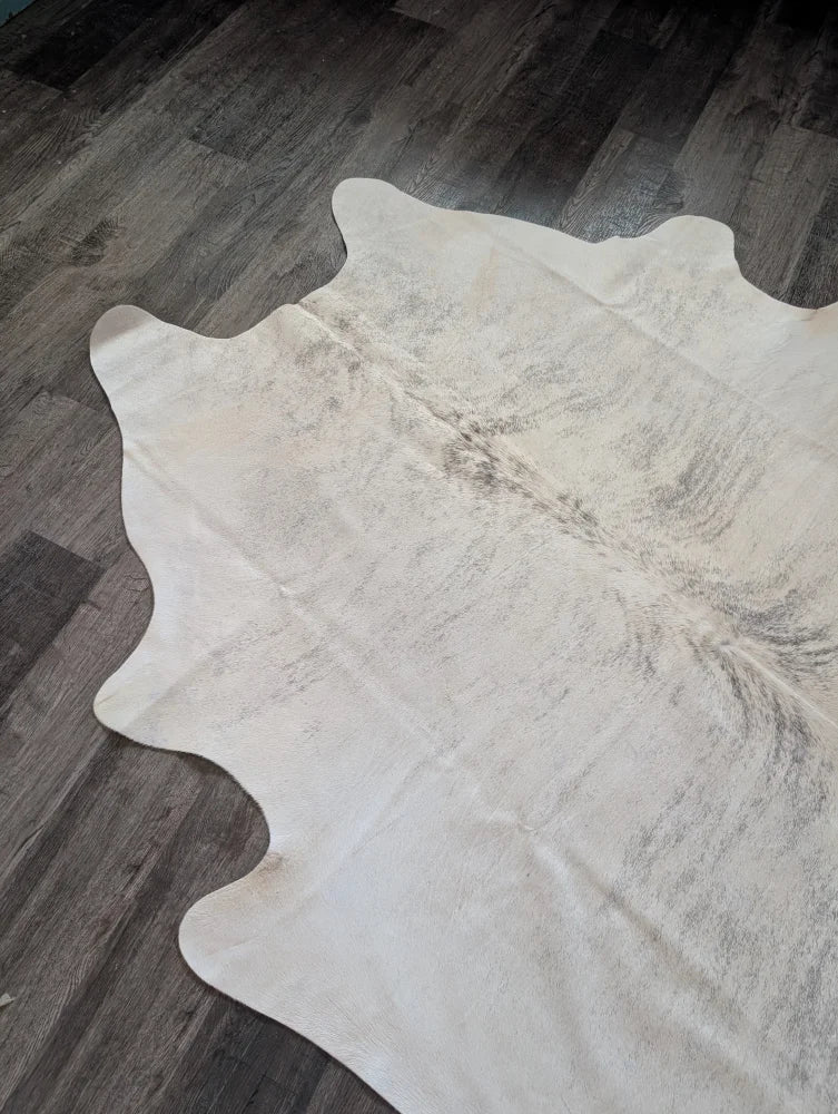 Large white cowhide rug es11 with natural edges and subtle grayish brown markings perfect for beautiful rugs