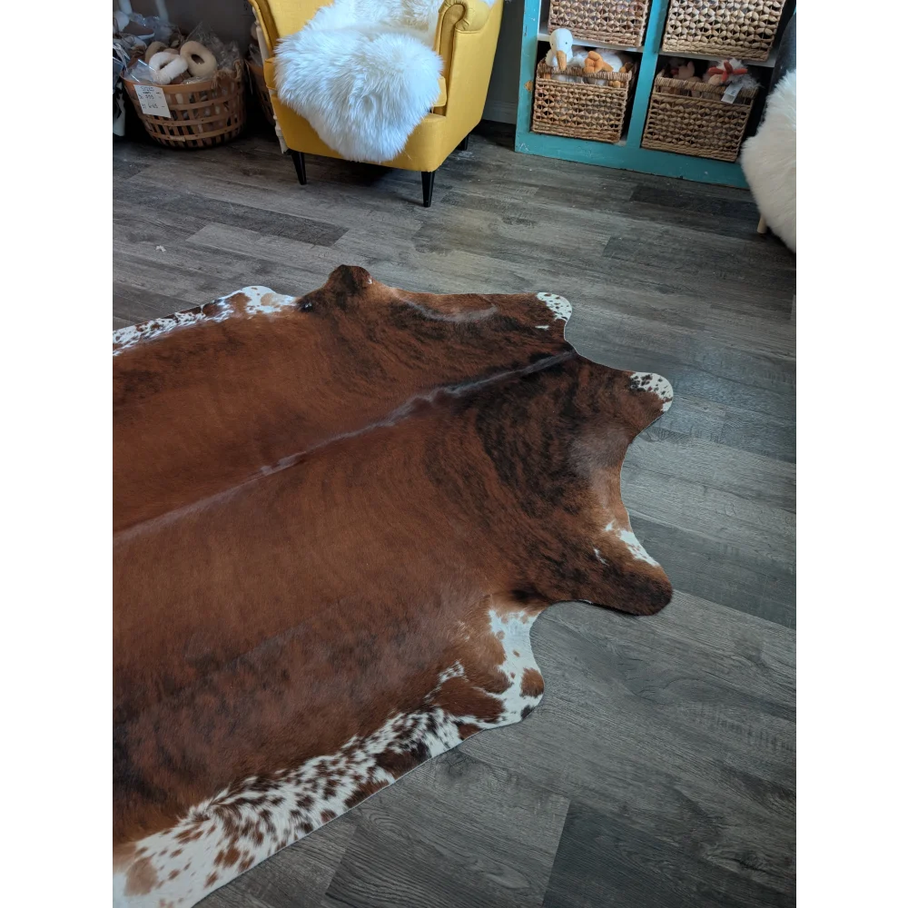 Large cowhide rug es12 featuring brown and white natural irregular patterns perfect for beautiful rugs