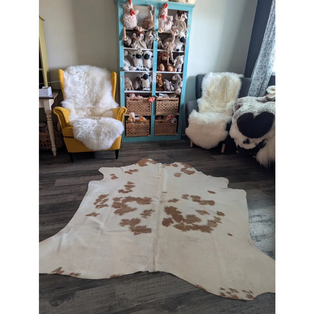 Es#17 large cowhide rug 71 by 70 inches with cream color and brown patches perfect for beautiful rugs