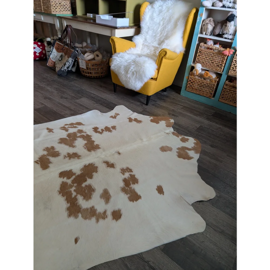 Large cowhide rug es17 71 x 70 with white base and brown patches featuring beautiful rugs and authentic texture