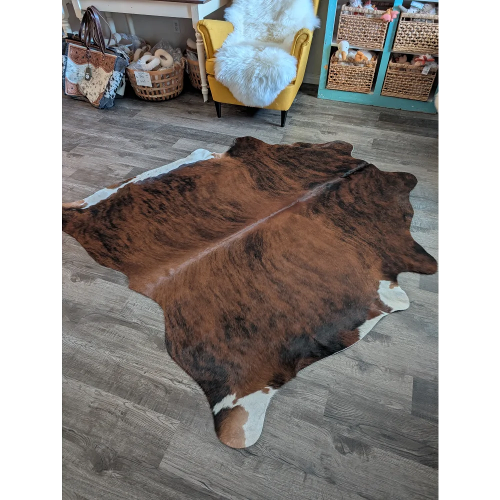 Es19 75 x 68 large cowhide rug with beautiful brown and white natural edges perfect for stylish home decor