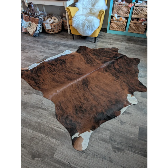 Es19 75 x 68 large cowhide rug with beautiful brown and white natural edges perfect for stylish home decor