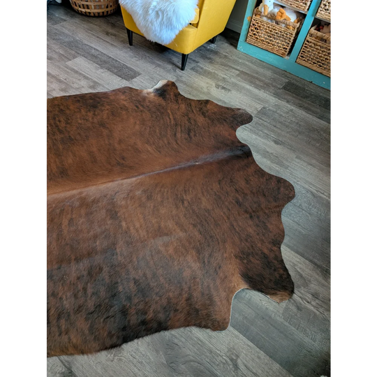 Brown large cowhide rug es22 with natural edges and textured surface perfect for beautiful rugs collection