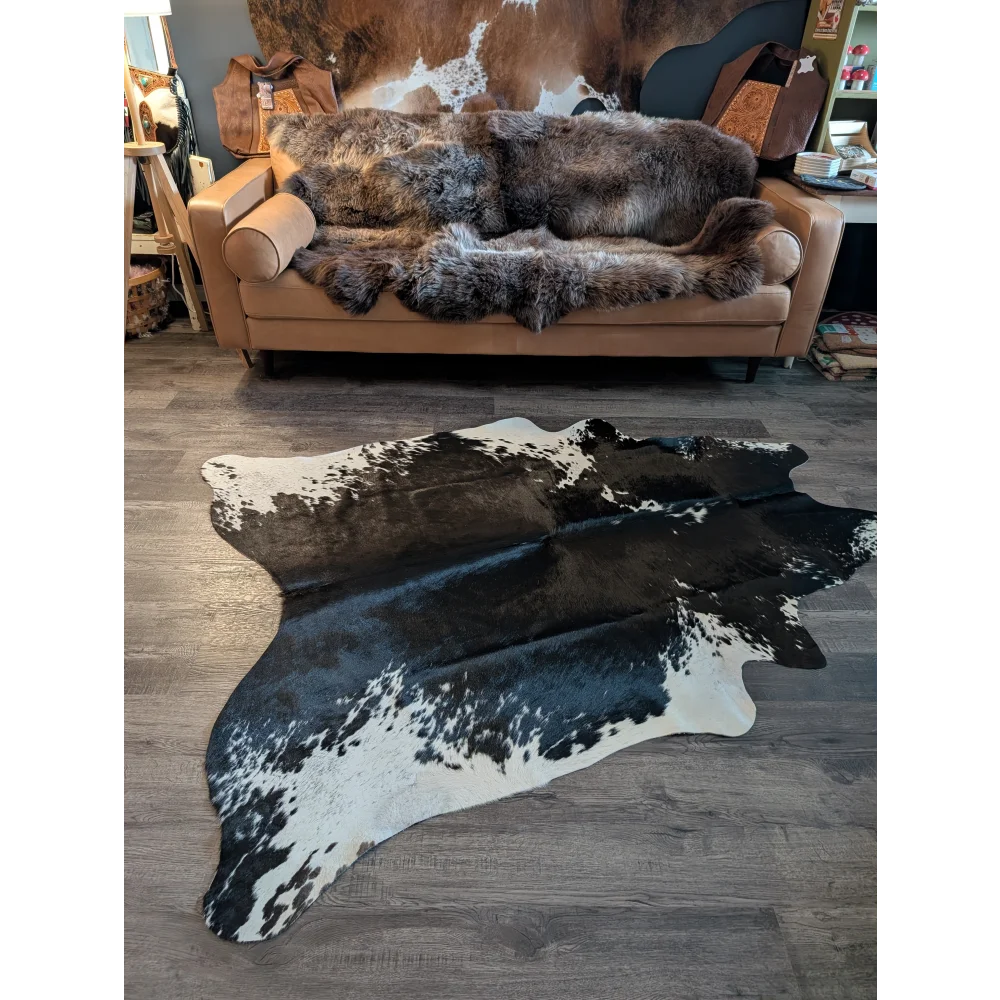 Large black and white cowhide rug es702 with natural fur texture perfect for beautiful rugs and home decor