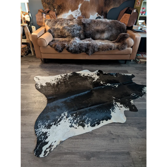 Large black and white cowhide rug es702 with natural fur texture perfect for beautiful rugs and home decor