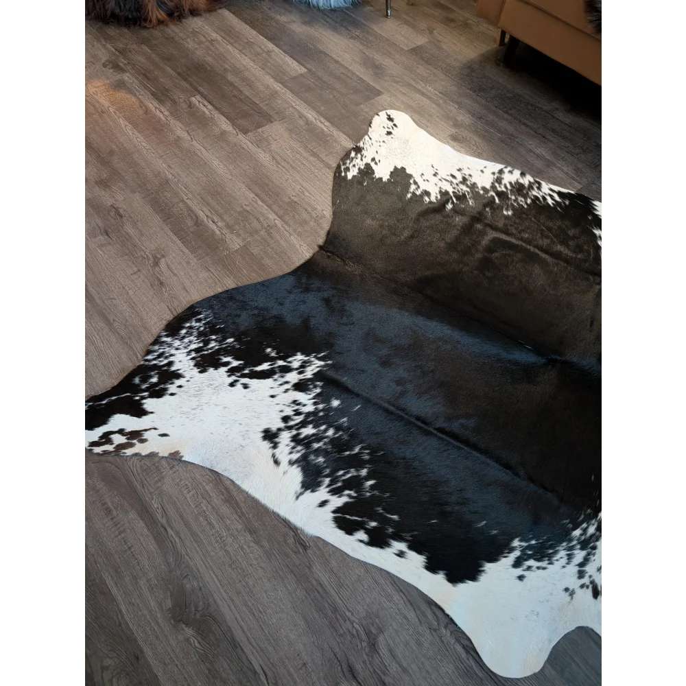 Beautiful large cowhide rug es702 with black and white natural irregular patterns perfect for stylish rooms