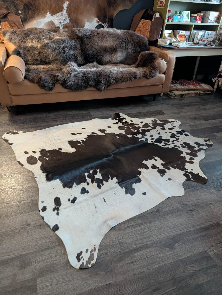 Large cowhide rug with unique black and white spotted pattern natural cowhide perfect for stylish floor decor