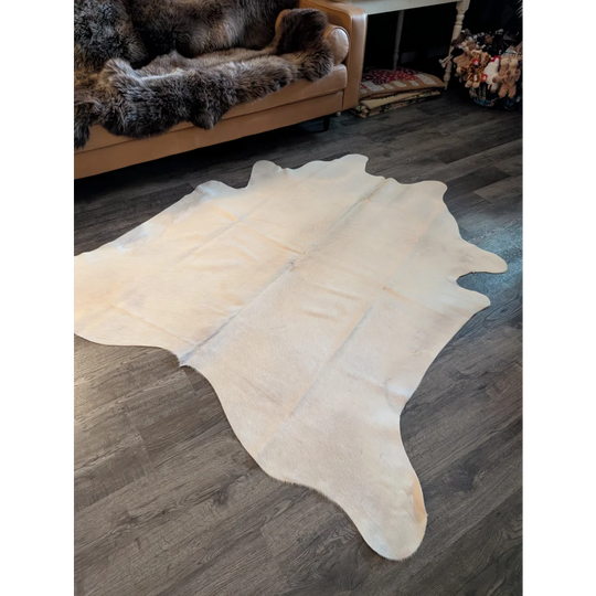 Large cream cowhide rug es707 with natural fur texture and subtle tan markings perfect for beautiful rugs
