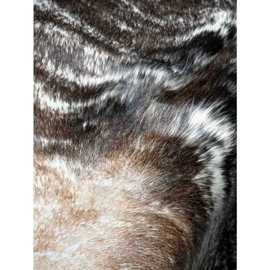 Extra large cowhide rug with intricate black and white fur patterns