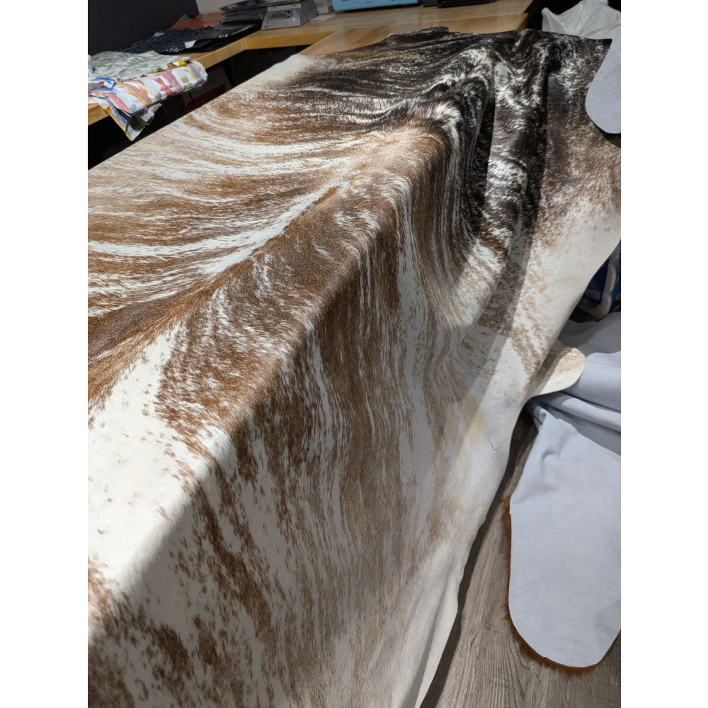 Extra large cowhide rug with brown white markings, 102x91 inches