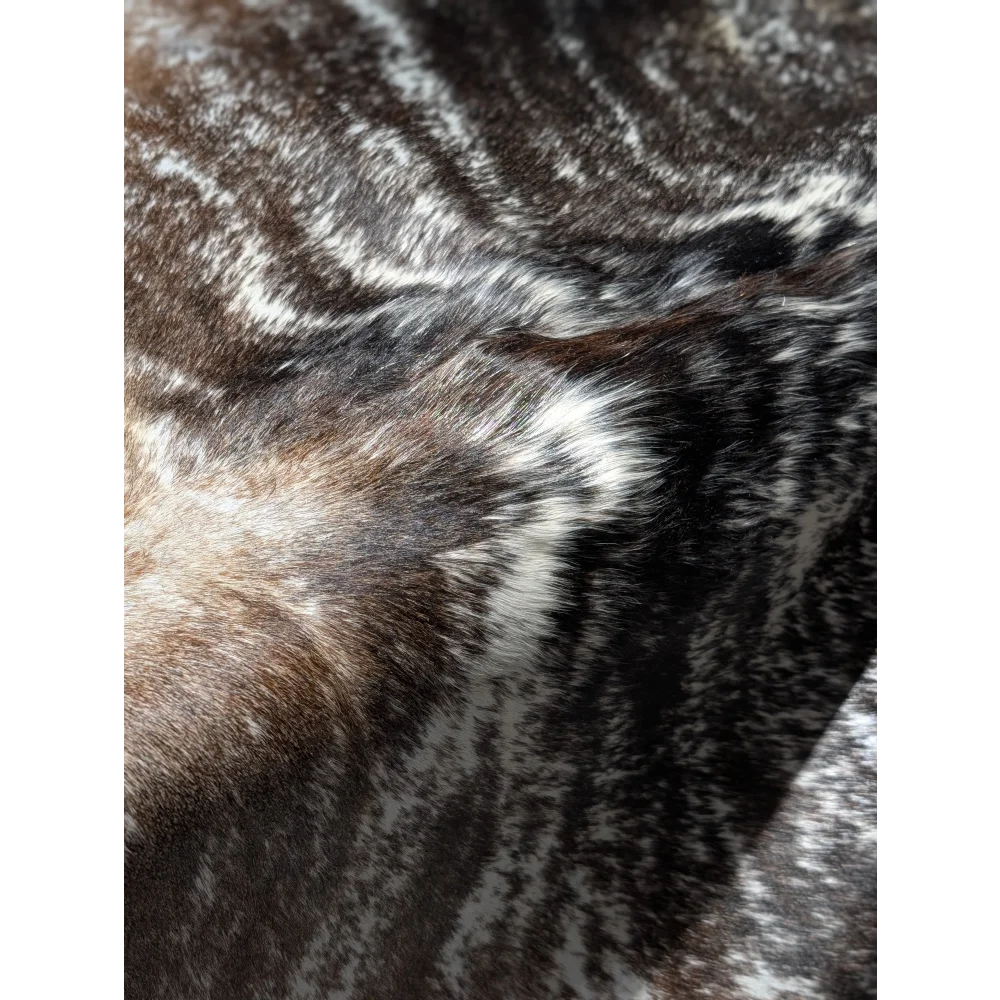 Stylish black and white extra large cowhide rug with textured fur pattern