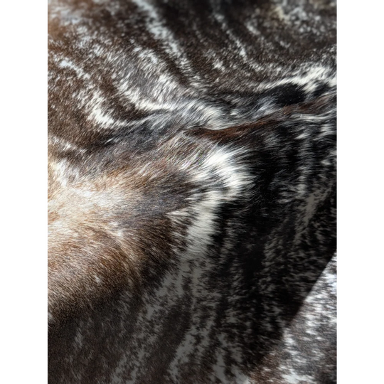 Stylish black and white extra large cowhide rug with textured fur pattern