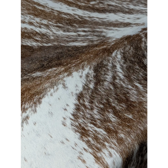 Extra large cowhide rug with brown and white spots, leather texture