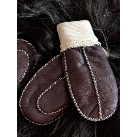 Fabulous sheepskin kids mittens in brown leather with white stitching