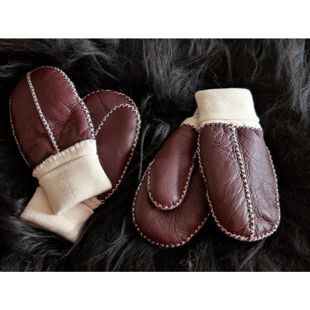 Fabulous sheepskin kids mittens in brown leather with cream lining for warmth