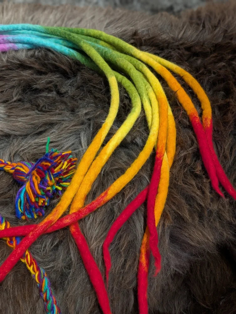 Rainbow-colored felt dreadlocks on Fabulous Wool Rainbow Hat, perfect for a rainbow rasta hat look