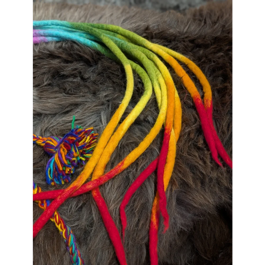 Rainbow-colored felt dreadlocks on Fabulous Wool Rainbow Hat, perfect for a rainbow rasta hat look