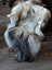 A plush fall2 58 x 30 inch massive icelandic sheepskin rug with long wool icelandic natural grey fur on wooden chair back