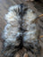 A plush fall4 58 x 40 inch massive icelandic sheepskin rug with long wool icelandic fur in gray black and cream colors