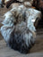 A plush long wool icelandic sheepskin throw in natural grey gradient perfect for cozy home decor