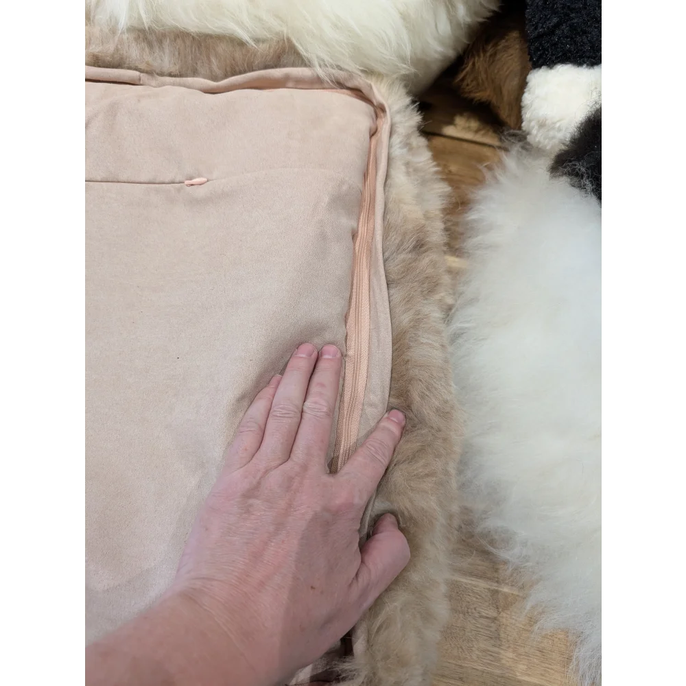 Cozy beige quilted highland sheepskin pet bed with pink lining
