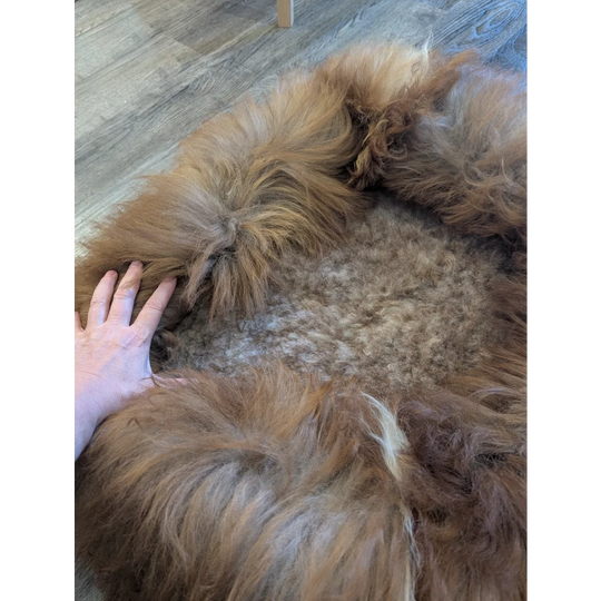 Brown fluffy sheepskin pet bed toy with soft textured wool