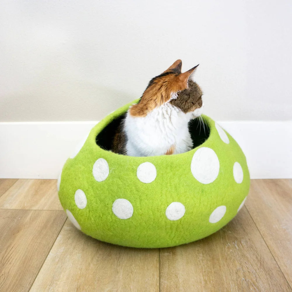 A lime green felt wool cat cave with white polka dots perfect as an eco kitty cave by friendsheep eco kitty