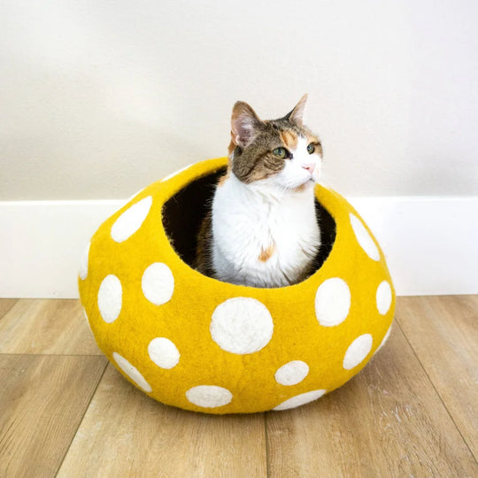Yellow felt wool mushroom-shaped eco kitty cave with white polka dots perfect for friendsheep eco kitty lovers