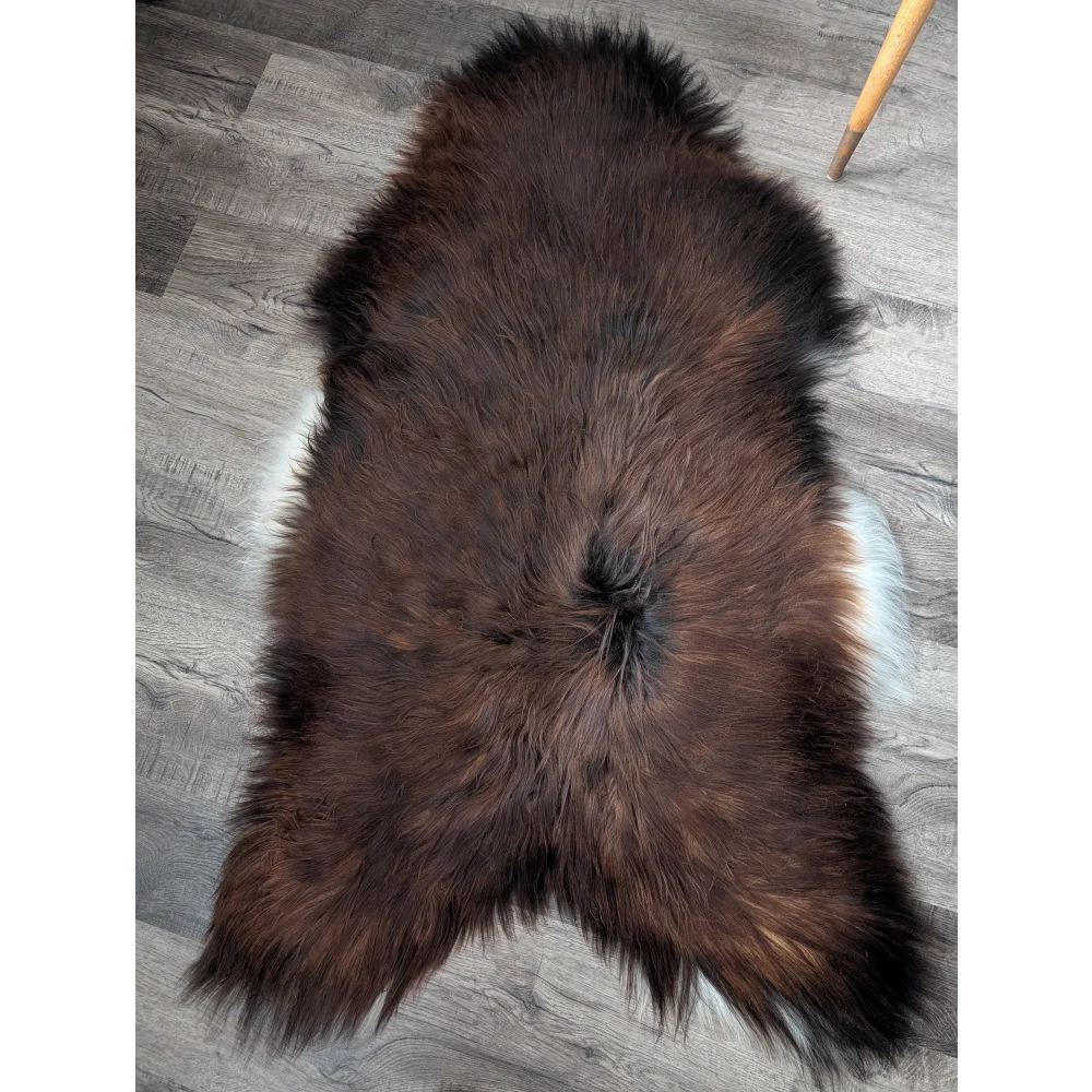 Gorgeous 56x33 Icelandic sheepskin rug by Angus Oliver, brown fur with white tips