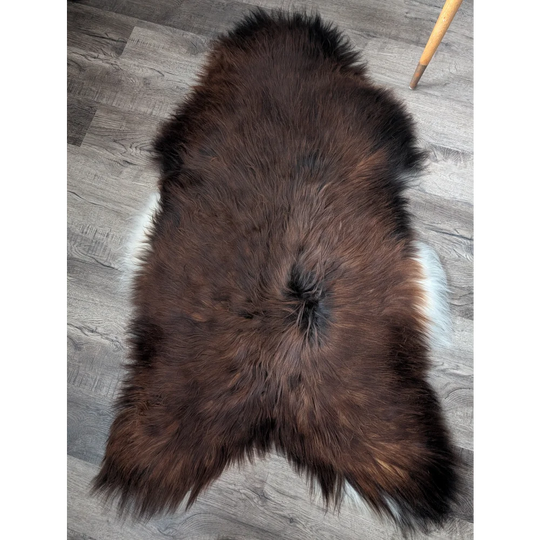 Gorgeous 56x33 Icelandic sheepskin rug by Angus Oliver, brown fur with white tips