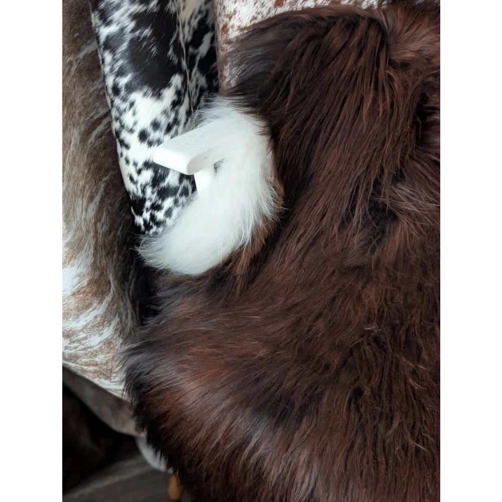 Gorgeous 56x33 Icelandic sheepskin rug by Angus Oliver, brown fur with white accents