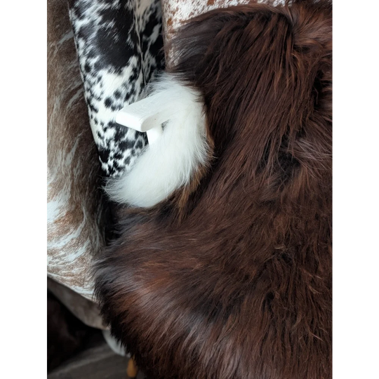 Gorgeous 56x33 Icelandic sheepskin rug by Angus Oliver, brown fur with white accents