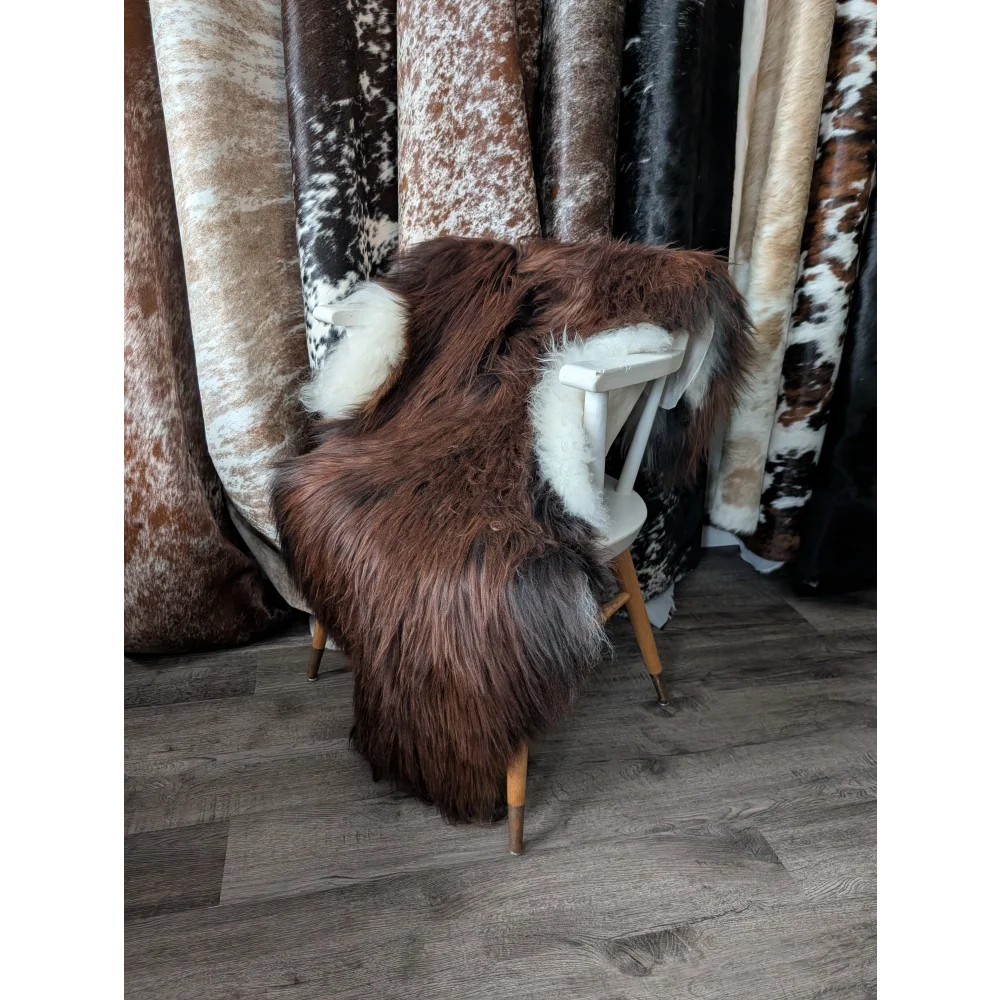 Gorgeous 56x33 Icelandic sheepskin rug by Angus Oliver, brown white fur throw on wooden legs