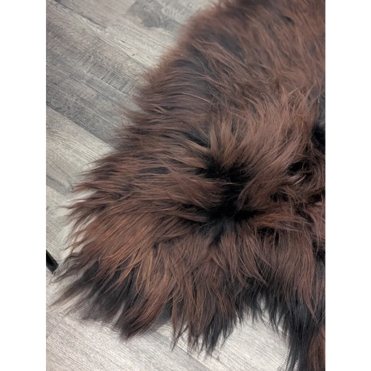 Gorgeous 66x36 Icelandic sheepskin rug by Angus Oliver, brown fluffy faux fur with black accents