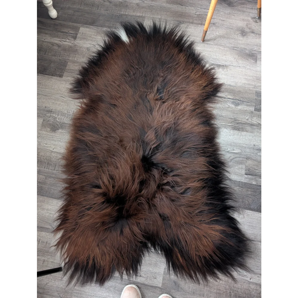 Gorgeous 66x36 Icelandic sheepskin rug by Angus Oliver with brown fur and black tips