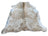 A large cowhide rug flashybeige 835 with natural tan and white colors and unique characteristics perfect for beautiful rugs